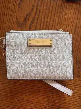 Michael Kors White Logo Wristlet with Gold Plate